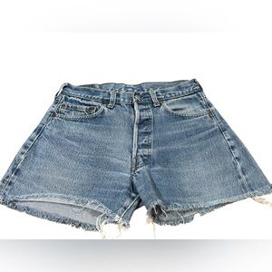 Levi’s 501 – Size 26 – button fly – raw hem cutoffs.